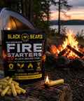 Weatherproof Campfire Starter Plugs Pack of 50 in front of campfire, used for quick fires in wet weather, made in USA, yellow plugs.