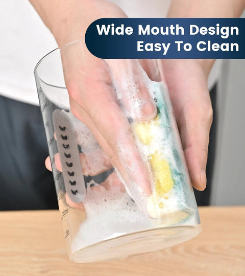 Person cleaning a Sourdough Starter Kit 2 Pack 34Oz Organic Glass Jars Wide Mouth With Lids, showing easy to clean feature.