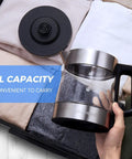 Electric Glass Kettle 1L, Fast 1500W Boil, Cordless Tea Kettle With LED Indicator, shown in a suitcase with its lid.