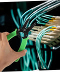 Portable Wire Stripper Pliers With Soft Grips Rapidly Strips Copper Jacketing in use on cables by an electrician.