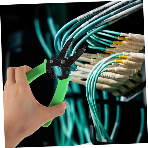 Portable Wire Stripper Pliers With Soft Grips Rapidly Strips Copper Jacketing in use on cables by an electrician.