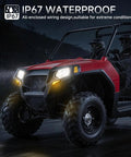 ATV with Universal UTV Turn Signal Kit With Horn, Hazard Lights, And Lever Column Switch during night on wet road