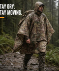 Man wearing military style tactical ripstop camo rain poncho in forest, all weather waterproof protection for outdoor survival.