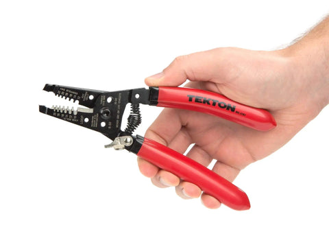 Hand holding 7 Inch Wire Stripper Tool Built Tough With Hardened Steel, Strips 10-20 AWG Solid And Stranded Wire, Serrated Pliers Jaw Grips
