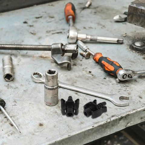 Heavy Duty 2 Pack Heater Hose Connector Plug And Play Fitting For Radiator Coolant Outlet and Auxiliary Water Tank on a cluttered workbench.