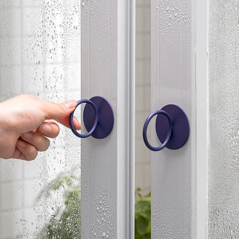 Hand using Adhesive Stick On Cabinet Handles 3 Pack Triangle And Hexagon Pull Knobs No Drill Easy Install For Cupboards, Closets, Drawers And Dressers