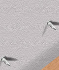 Rock Solid Grip Smooth Sailing Install Kickass Carbon Steel Double Head Baseboard Screws With Pilot Sleeve For Seamless Molding And Drywall Invisible Nails 100 Pack on gray textured wall.