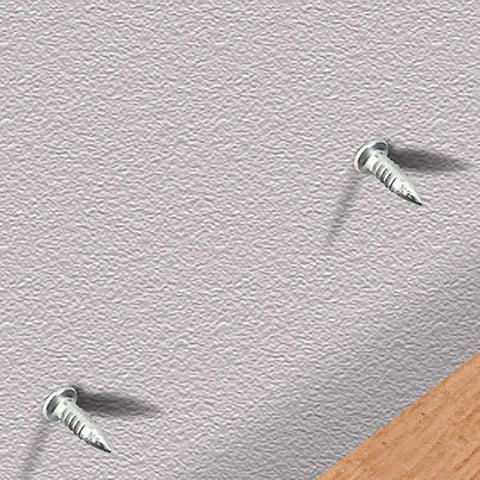 Rock Solid Grip Smooth Sailing Install Kickass Carbon Steel Double Head Baseboard Screws With Pilot Sleeve For Seamless Molding And Drywall Invisible Nails 100 Pack on gray textured wall.