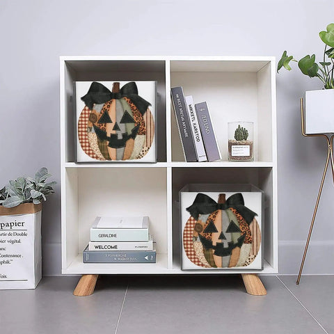 Kicker Quality Patchwork Fabric Storage Cube Built For Quick Room Upgrades With Heavy Duty Stitching And A Knockout Pumpkin Silhouette in a shelf.