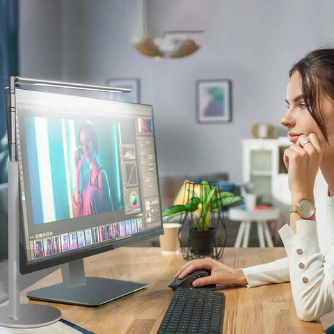 Woman using computer with Eye Friendly Desk Lamp For Home Office And Monitor Setup No Flicker LED Task Light, aluminum build