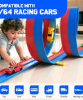 Child playing with 20ft Flex Roll Up Slot Car Race Track For Kids with four alloy cars, loops, and strong suction cups indoors.