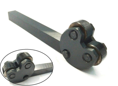 Closeup of a Lathe Knurling Tool Attachments Duo Set Of 2 For Metalworking with textured wheels and durable steel arm.