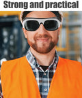 Kickass Welding Safety Glasses Featuring Wide Side Coverage And Mask Compatible Design For Total Eye Protection With Ridiculously Comfortable Fit Guaranteed, worn by a smiling man in a safety vest.
