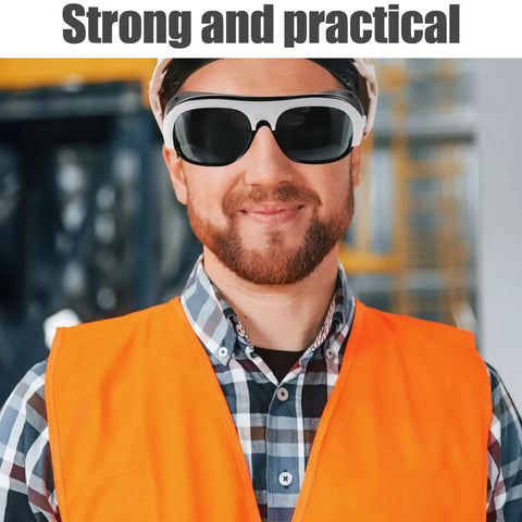 Kickass Welding Safety Glasses Featuring Wide Side Coverage And Mask Compatible Design For Total Eye Protection With Ridiculously Comfortable Fit Guaranteed, worn by a smiling man in a safety vest.