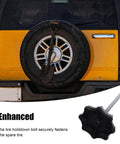 Universal Fitment Spare Tire Hold Down Bolt Replacement Mounting Hardware Clamp with shovel and spare tire on vehicle rear