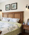 Bedroom with set of 2 black farmhouse vanity wall lights with seeded glass shades sleek modern metal sconce fixtures for decor