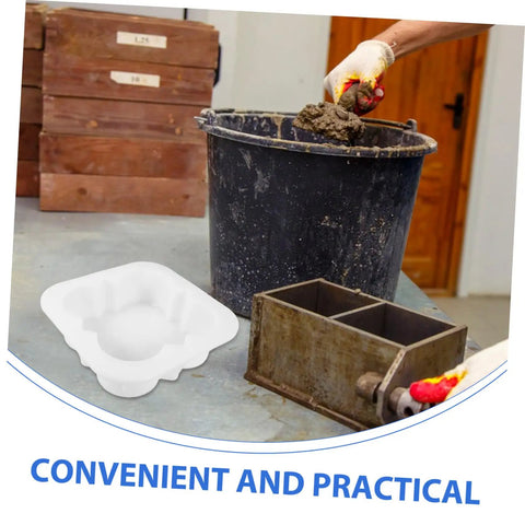 Concrete Paver Mold For Pathways And Patios Easy To Use Stepping Stone Molds next to bucket with concrete mix in workshop
