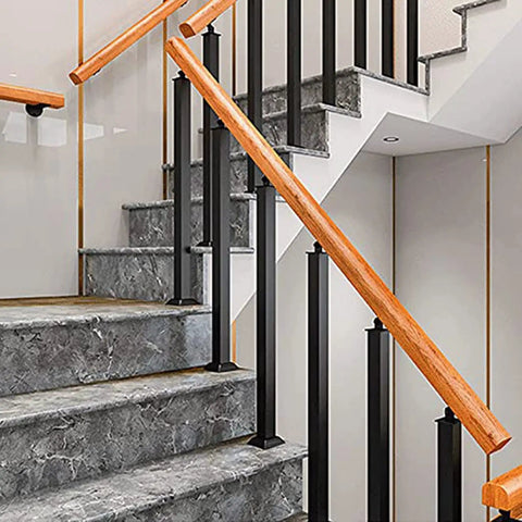 Top Shelf Square Wrought Iron Baluster Posts Built Like A Tank Black Powder Coated Banister Rails For Outdoor Deck And Staircase Project 4 Pack 39 Inch Height Smooth Finish Railing Kit on a staircase with wooden handrail.