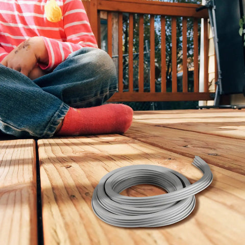 Flexible EPDM Concrete Expansion Joint Filler For Driveways And Cracks Weather Resistant Rubber Strip Repair Replacement Joint 1 Inch Wide 15 Feet Long Cut To Fit For Easy DIY Fix visible on wooden deck.
