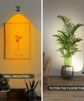 Wireless Spotlight Set With Remote Control Battery Powered LED Grow Lights illuminating wall art and indoor plant.