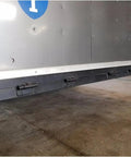 Installed Beefed Up Weld On Butterfly Ramp Hinge With Grease Fitting for cargo trailer doors, black raw steel finish, 1000 lb capacity