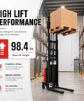 Heavy Duty 1.6 KW Semi Electric Pallet Stacker With 3500 Lb Lift Cap lifting pallets to 98.4 in in a warehouse aisle.