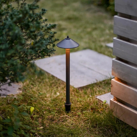 Low Voltage LED Pathway Lights 6 Pack Outdoor Landscape Lighting 40 Lumen 2700K Warm White Weatherproof Garden Path Kit For Lawn Patio Yard Walkway Driveway No Brainer showing a single light in a garden.