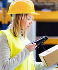 Six Pair Set Top Shelf protective Safety Glasses With smart Vitilated Wraparound Frames worn by woman in hard hat at work.