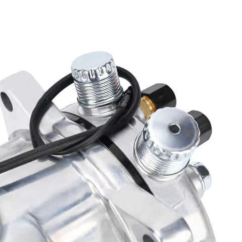 Close-up of Heavy Duty Universal AC Compressor With Clutch Included For Quick Car Cooling Fixes Built Tough With Cast Aluminum Housing.