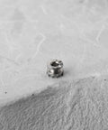 Close-up of a clutch wheel from Winding Stem Clutch Repair Tool Kit For ETA 2836 2824 2834 2846 Movements on stone surface