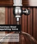Large Capacity Cold Brew Coffee Maker Tower With 1000ml Vertical Glass Carafe And Solid Wood Stand close-up of stainless steel regulating valve ensuring precise control.