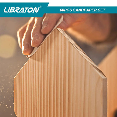 Hand sanding wood with Ultimate Sandpaper Kit For Woodworking 60 Pc Assortment with 80 120 400 600 grit sheets.