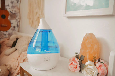 Droplet Ultrasonic Cool Mist Humidifier For Bedroom And Office 0.5 Gallon Mini Humidifier Blue And White Finish next to decors