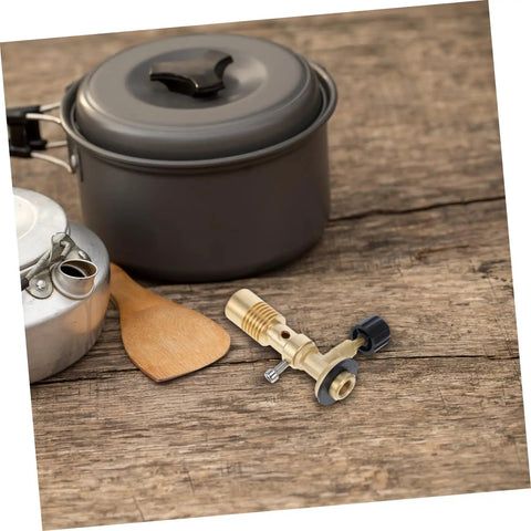 Portable Gas Blowtorch Head For Camping And Outdoor Cooking next to camping cookware on wood surface