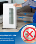 Person using 8 Pack Large Furniture Sliders For Carpet And Hardwood Floors 9.5 By 5.75 In Moving Pads under a cabinet on hardwood floor