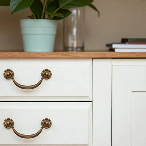 Vintage Drop Bail Drawer Pull Handle in Antique Bronze Finish on white cabinet, 4.5 Inch Center Hole Distance 114mm, furniture hardware