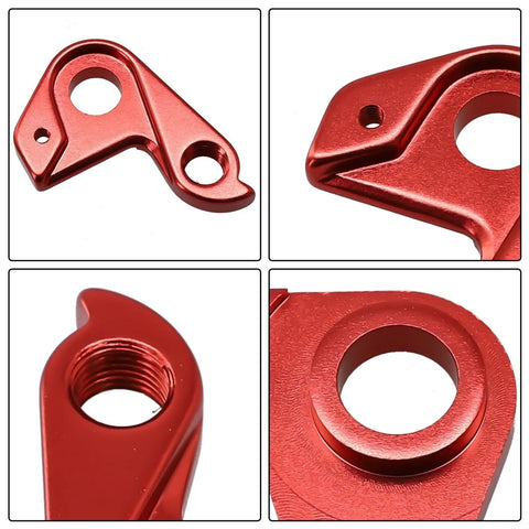 Close-up of red Derailleur Hanger Aluminum Alloy Bicycle Frame Mount for Mountain and Road Bikes Heavy Duty Construction
