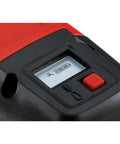 Close-up of Workhorse DX 5 MX Powder Actuated Tool Kit with power display and control button on construction tool
