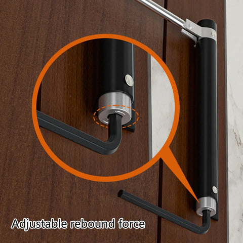 Close-up of Automatic Rebound Door Closer For Home Use Surface Mounted Spring Closer with adjustable hinge on wooden door.