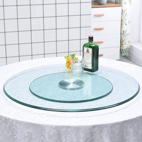 24 Inch Heavy Duty Lazy Susan 360-Degree Turntable with Tempered Glass on dining table with bottle and glasses.