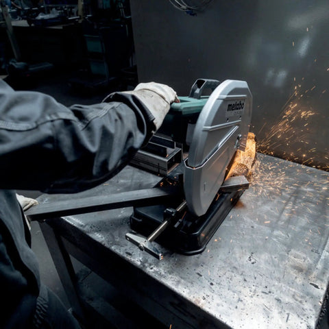 14-Inch Metal Chop Saw With Quick Clamp And Variable Mitre For -15 To 45 Degree Cuts in use, cutting metal, Model CS 22-355.