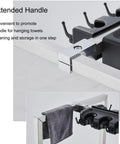 Close-up of extended handle on Mop And Broom Holder With Wheels For A Grab And Go Cleaning Cart That Keeps Tools Dry