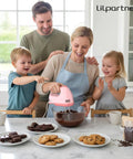 Family using Hand Mixer Electric With Seven Speeds And Five Stainless Attachments Copper Motor Power Dishwasher Safe 304 Parts Whisk Beaters And Dough Hooks Light Pink Easy Cleanup Kitchen Must Have For Home Cooks, preparing chocolate batter in kitchen.