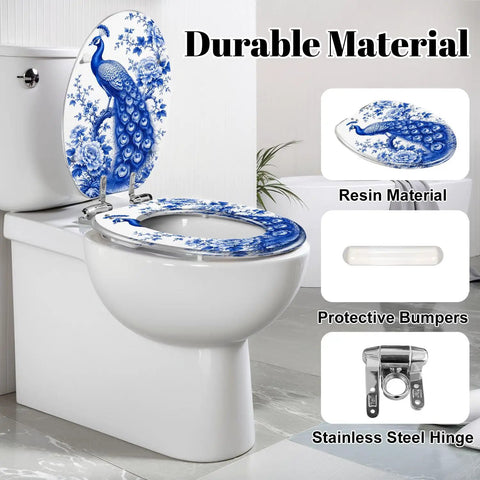 Elongated Chinoiserie Blue Peacock Floral Design Traditional Toilet Seat on white toilet, featuring resin material and stainless steel hinge.
