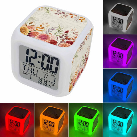 Chill Autumn Floral Silent Alarm Clock With Smooth Snooze And Soft Glowing Nightlight Hella Compact Desk Time Date And Temp Display For Bedrooms And Home Offices in multiple colors.