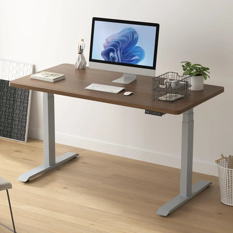 Stylish Grey Dual Motor Electric Standing Desk Frame With Built In Usb A Plus C Charging Ports Smooth Height Adjustable Sit Stand Base Sturdy Steel Legs For Home Office Workstation Setup Super Easy To Assemble with wooden top and computer setup.