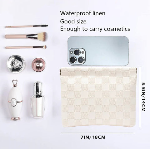 Leather Cosmetic Pouch For Purse With Secure Snap Closure And Slim Profile next to cosmetics and phone, 7x5.5 inch waterproof design.
