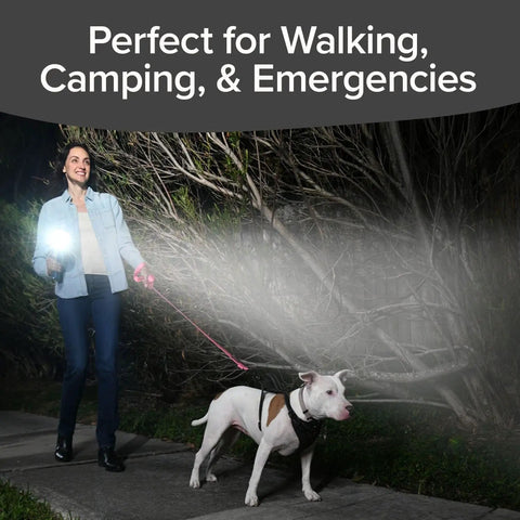 Person walking dog with Monster Bright Rechargeable Spotlight With 10 Modes And Turbo Boost To 100 Percent Built In Kickstand And USB Charger