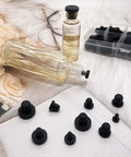 Heavy Duty Silicone Rubber Hole Plugs Set With 9 Sizes T Type Black Caps for Powder Coating and Waterproof Sealing on table.