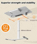 Flex Your Workspace Routine With This Slick Rollaway Standing Desk Featuring A Roomy Desktop Pull Out Storage Bin Built In Mug Holder Heavy Duty Side Hooks And Easy Glide Wheels, showing sturdy frame and strength details.